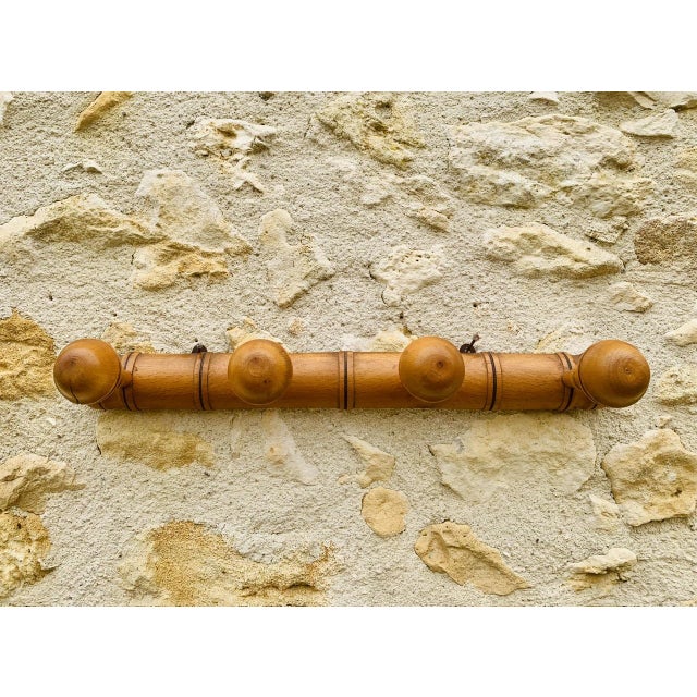 Mid-century, vintage, wall mount coat rack from the 50's - 60's. This coat rack from France, is made of turned wood,...