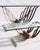 Selling a rare matching vintage sculptural glass-top console table and coffee table set. The larger table appears to be...