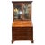 DETAILS Hand fashioned of beautiful slightly figured mahogany, this lovely antique desk features double doors with...