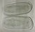 Pair of 1970s vintage clear glass fish platters designed by Ann and Gorman Warf for Kosta Boda, Sweden. Each is unique, so...