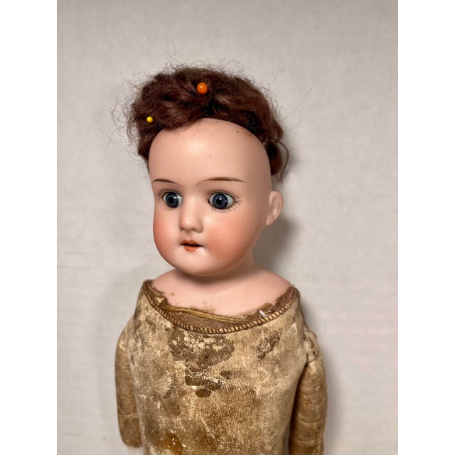 1900's Antique Armand Marseille Floradora A7/0M Bisque Doll Made in Germany Aprox. dimensions: 16"H Condition: This is a...