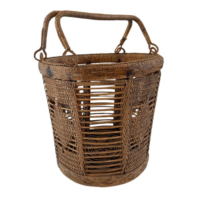 Vintage Handwoven Rattan Basket With Double Handles and Geometric Weave For Sale