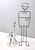 Made in Italy, 1980s. This is a reinterpretation of Cesare Lacca's design of a tripod coffee table in the 50s. This coffee...