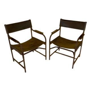 Naturally Distressed Low Profile Industrial Era Safari Armchairs in Curved Steel Frames and Riveted Leather After Marcel Breuer - Set of 2 For Sale