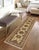 Enhance the ambiance of your home with this magnificent Persian-influenced Turkish hand-knotted rug made by skilled...