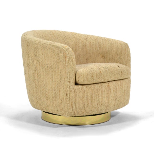 This barrel-back club chair is classic Baughman. Clean lined, elegant and comfortable, the round brass base has both...