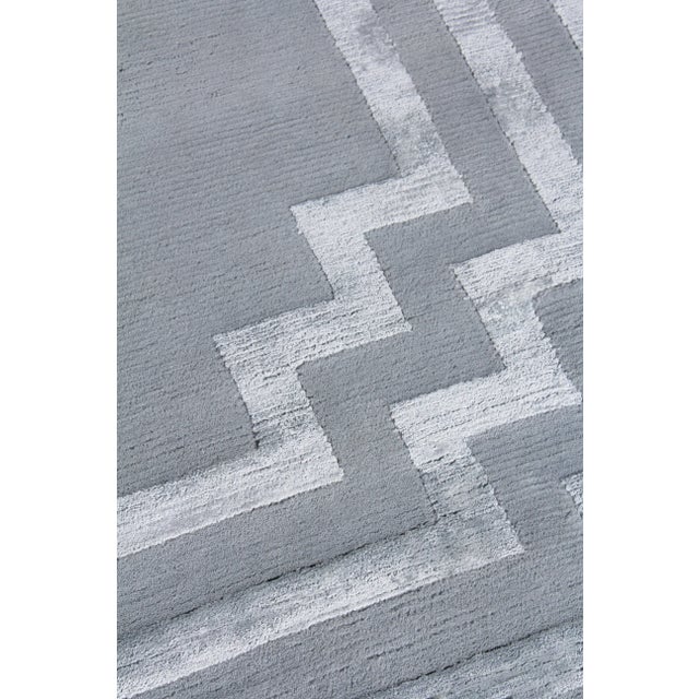 A refined foundation piece designed by elegance and ease! The Deza rug, handmade with fine New Zealand wool and a...