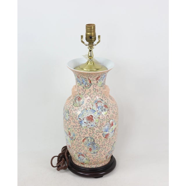 Get your bedroom blossoming with this reading light botanical lamp. The vase's light color and bright design makes it a...