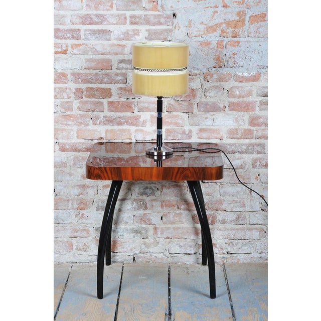 This elegant table lamp originates from the 1930s and stylistically belongs to the Art Deco / Bauhaus period. Its...