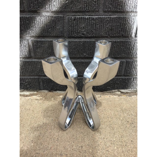 Striking "Chorus" candelabra in die-cast zinc with a chrome plating by Karim Rashid for Umbra, circa 2000s. Described by...