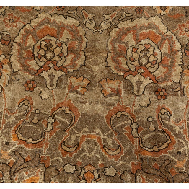 An early 20th century antique Amritsar carpet from our exclusive Antique Indian Rugs collection, the abrashed beige field...