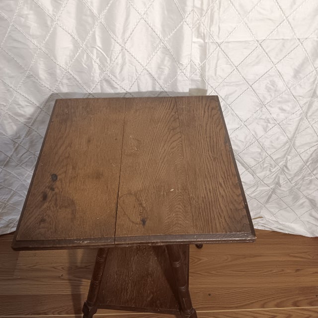 Early 19th Century Victorian Two Tier Splay Legs Parlor Accent Table. Bring a bit of history and old world craftmanship to...
