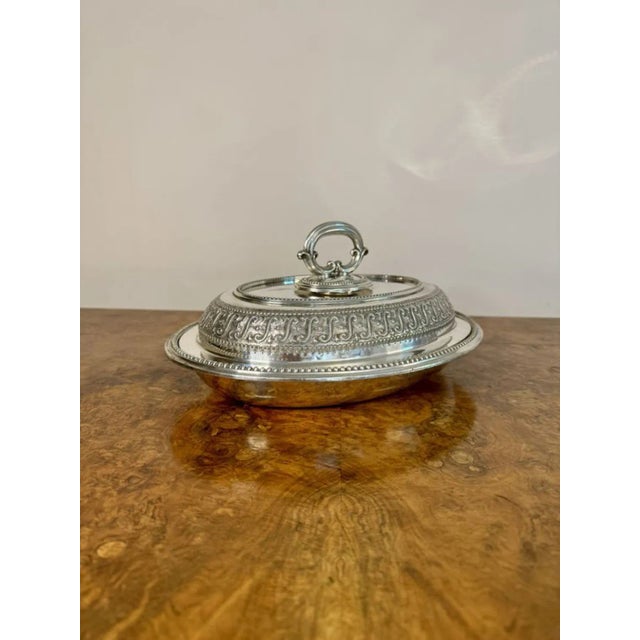 Stunning antique Edwardian quality silver plated entree dish, having a quality oval silver plated entrée dish with quality...