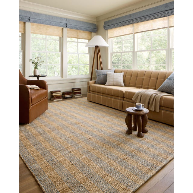 The Judy Collection from Chris Loves Julia x Loloi is a handwoven area rug made with natural fibers for an easygoing yet...