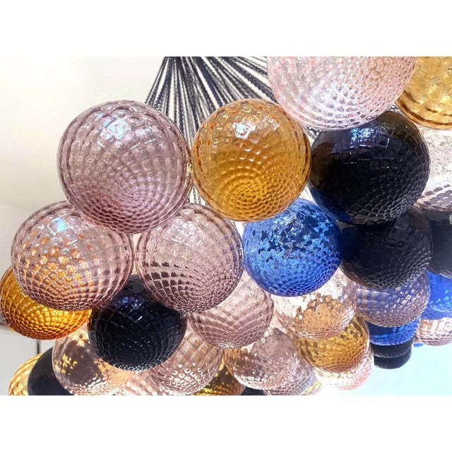 Impressive chandelier with vintage multicolored spheres in murano glass worked in “ballotton” traditional tecnique....