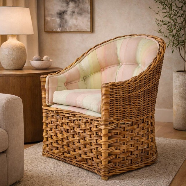 A charming and highly collectible vintage barrel lounge chair designed and manufactured in the United States in the 1980s...