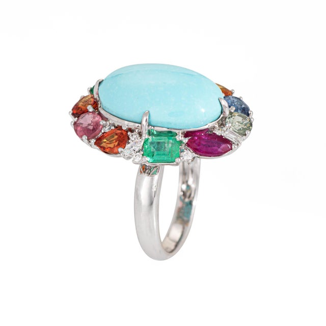 Stylish contemporary natural turquoise, rainbow gemstone, & diamond cocktail ring crafted in 18 karat white gold. Egg...
