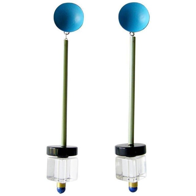 Post modern style pierced earrings created by Heidi Abrahamson of Phoenix, Arizona. Earrings consist of painted enamel...