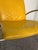 KEBE leather lounge chair in a bold mustard yellow leather with a brushed aluminum frame. KEBE is a Danish manufacturer...