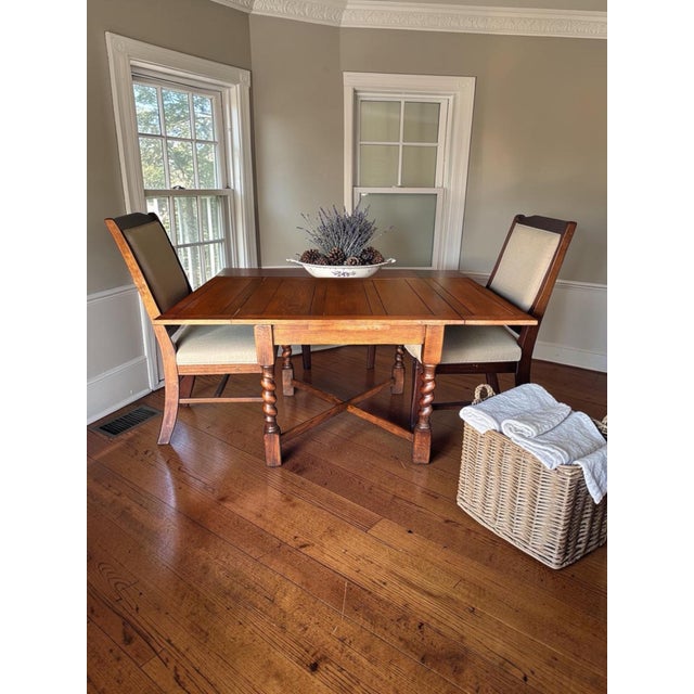 Bring timeless English charm and exceptional 20th-century craftsmanship into your home with this stunning 1930s solid oak...