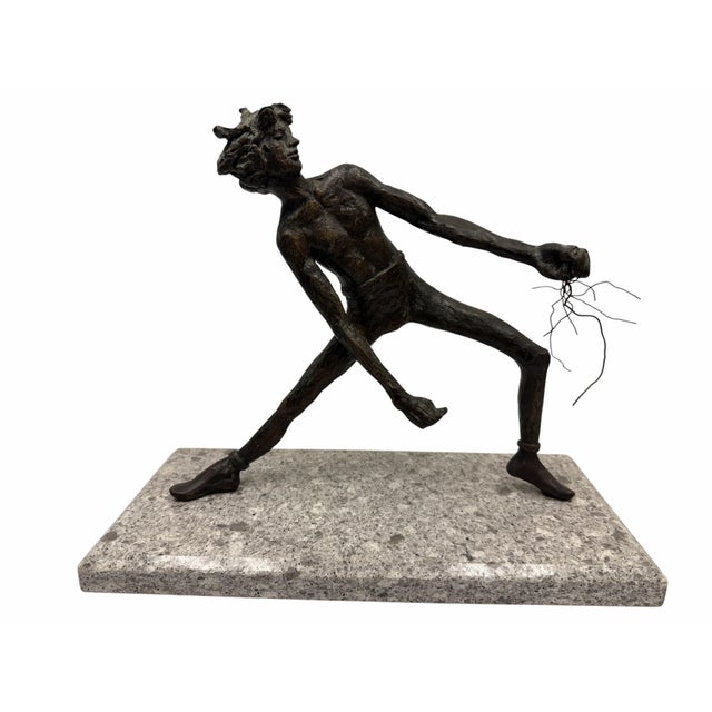 Overview An exceptional mid-to-late 20th-century figurative bronze sculpture titled "Lunging Athlete" by celebrated...