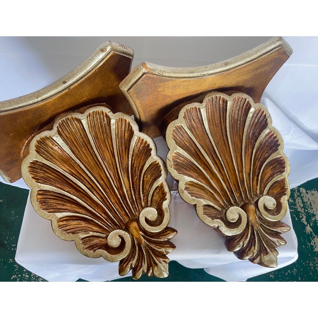 Wonderful and impressive, Pair of Florentine Large Carved Wood Shell Wall Brackets, made in Italy This pair has a deep...
