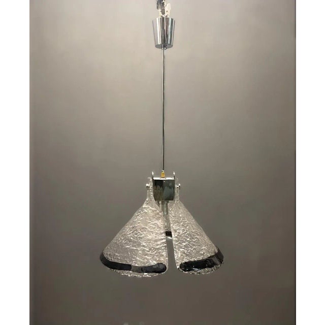Murano Glass Light Pendant 1970’s Clear mouth blown Murano Glass with a black rim Height including chain and ceiling...