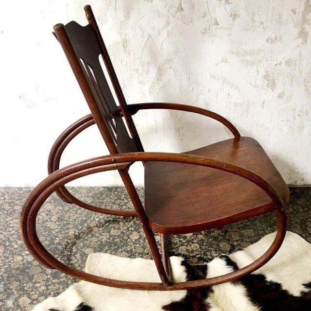 Children's rocking chair produced by Jacob & Josef Kohn in the early 1900s made of bent wood. The runners are very special...