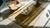 Aesthetic and Sublime Beige Open Field With Exquisite Floral Border Antique Chinese Peking Rug For Sale - Image 10 of 11