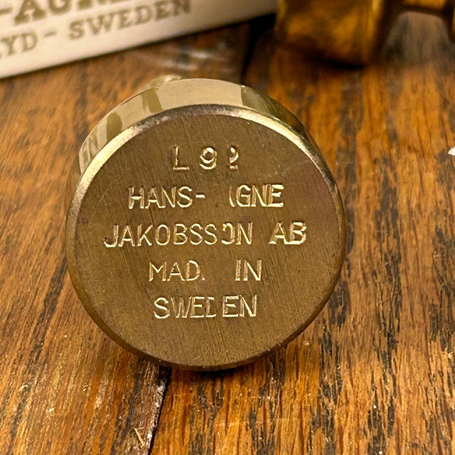 Immerse yourself in the timeless beauty of Hans-Agne Jakobsson brass candlesticks, a quintessential embodiment of a Modern...