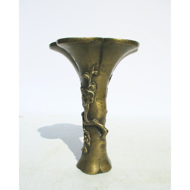 Antique Japanese fluted flower form vase with branches and flower prunus on the sides. Five lobed open mouth and lobed...