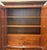 Elegant Ethan Allen Newport Collection armoire featuring a rich reddish-brown wood finish and striking, beautifully...