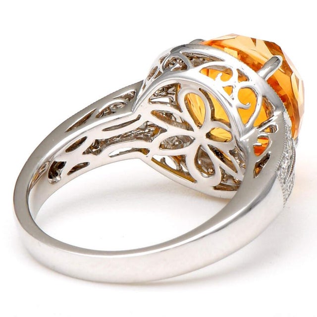 This simple, but eye-catching citrine and white gold ring is sure to please. The stone features a round cut that blends...