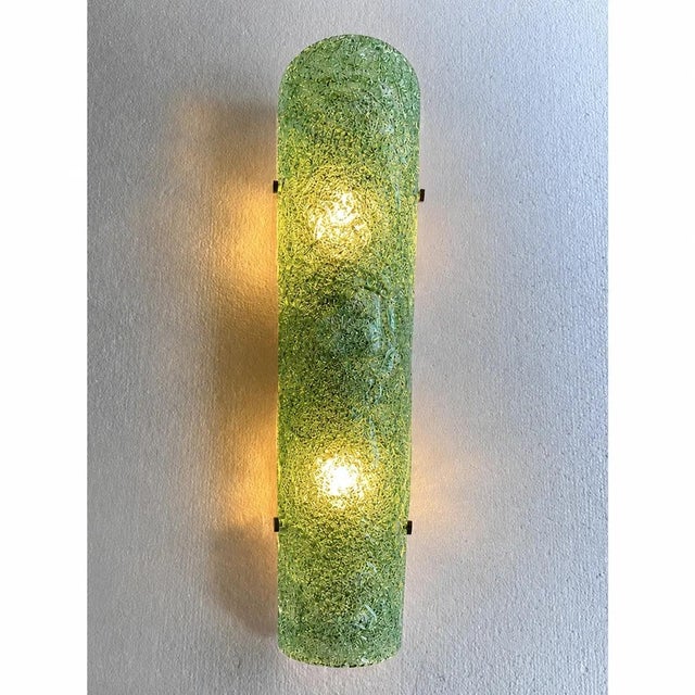 Contemporary luxury modern wall sconces made in green hammered murano glass with a traditional working of "graniglia". lot...