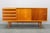 This elegant mid-century sideboard was produced in Czechoslovakia during the 1960s and reflects the clean geometry and...