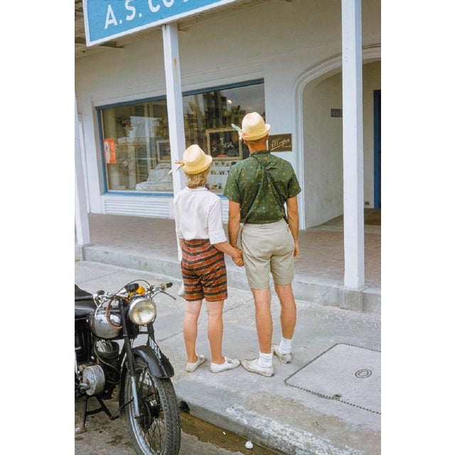Browsing in Bermuda by Toni Frissell Beachgoers enjoy browsing the near-by shops in Bermuda, 1960. (Toni Frissell)...