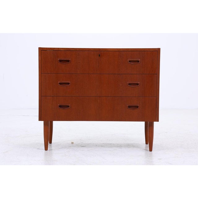 Beautiful vintage teak chest of drawers from the 1960s * High-quality workmanship * Material: Teak * 3 drawers DIMENSIONS...
