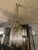 The most charming Chandelier . The structure is in brass the pendants are glass tubes. European Plug (up to 250V).The...