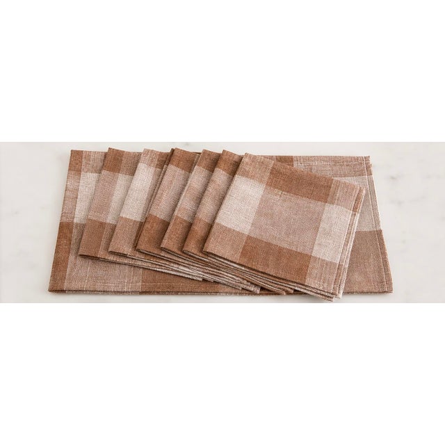 Warm, understated, and effortlessly versatile, this vintage Italian table linen set features a softly woven tobacco check...