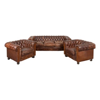 Set of Three Vintage Brown Leather Chesterfield Seating Group With Sofa and Pair of Club Chairs For Sale