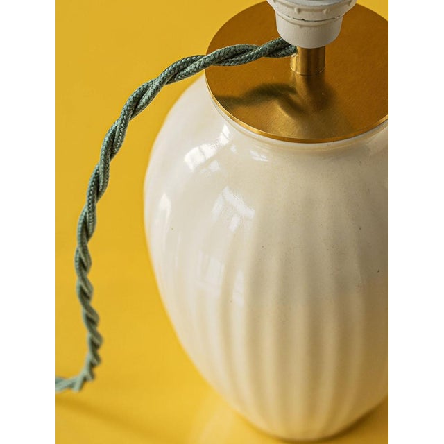 Rowe (in a nod to the designer of the lampshade pattern) is a one-of-a kind lamp lovingly handcrafted from a vintage Royal...