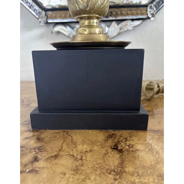 24.5" to top of finial 16" diameter at base of shade Likely mid 20th century Plinth feels made of wood (textured and...