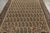 Handwoven in wool, circa 1900–1920, this antique 7x12 Malayer rug features an elegant all-over paisley design in ivory,...