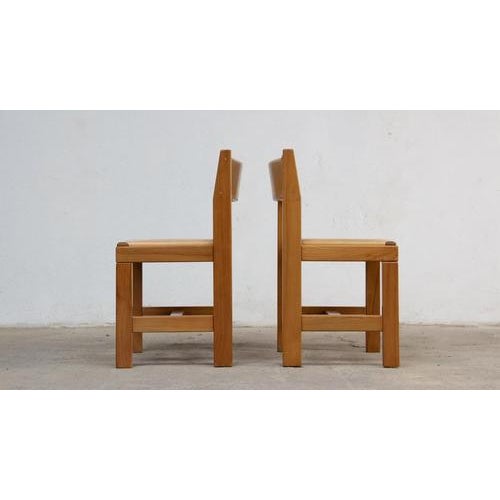 Set of brutalist chairs in solid elm and leather – maison regain – 1970s. This set of brutalist chairs was produced in the...