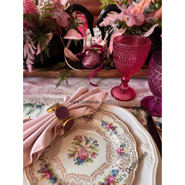 Here is a set of vintage Kim Seybert napkin rings in gold, pink and violet circles. They offer plenty of sparkle for your...