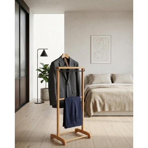 Valet stand in beechwood, German design, 1960s. The piece provides practical storage for clothing, with space for a jacket...