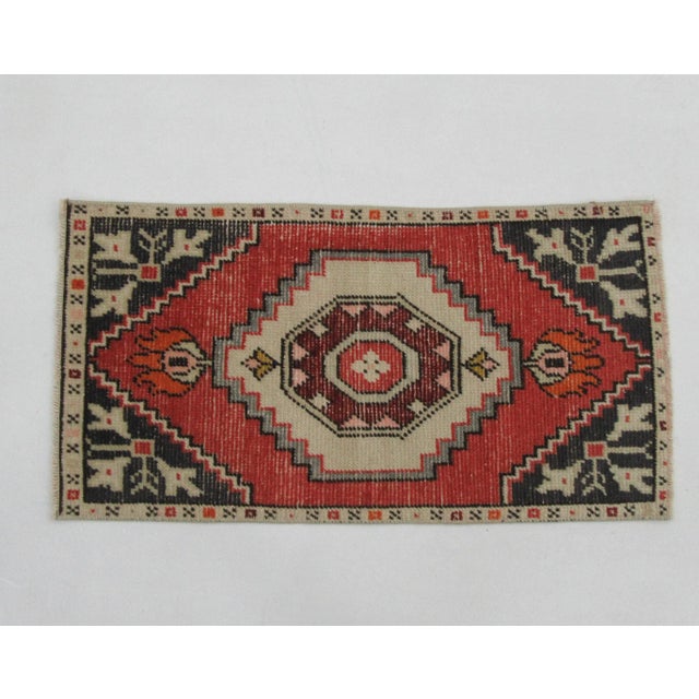 Vintage handknotted decorative mini rug from Konya region of Turkey. Approximately 50-60 years old. In very good condition.