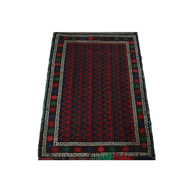 Hand knotted in wool, this 2x3 Baluch rug represents a new line of tribal carpets in the Modern Classics Collection by Rug...