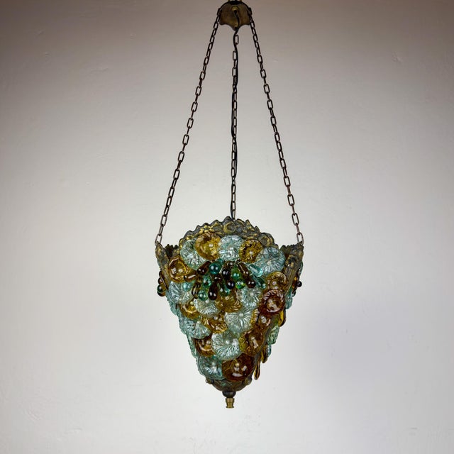 Antique murano glass pendant lamp made in italy in the 1900-10s. a rare and exquisite vintage handmade multicolored murano...