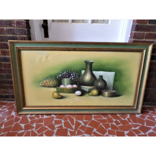 This is a Vintage Italian Mid Century Original Still Life Oil Painting on Canvas that is Artist Signed "Amadio" in it's...